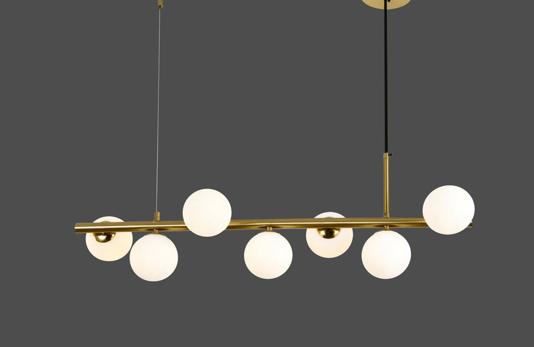 Pendul auriu cu 7 globuri 9560/7GD prezentat pe fundal gri; design geometric elegant cu becuri G9 LED